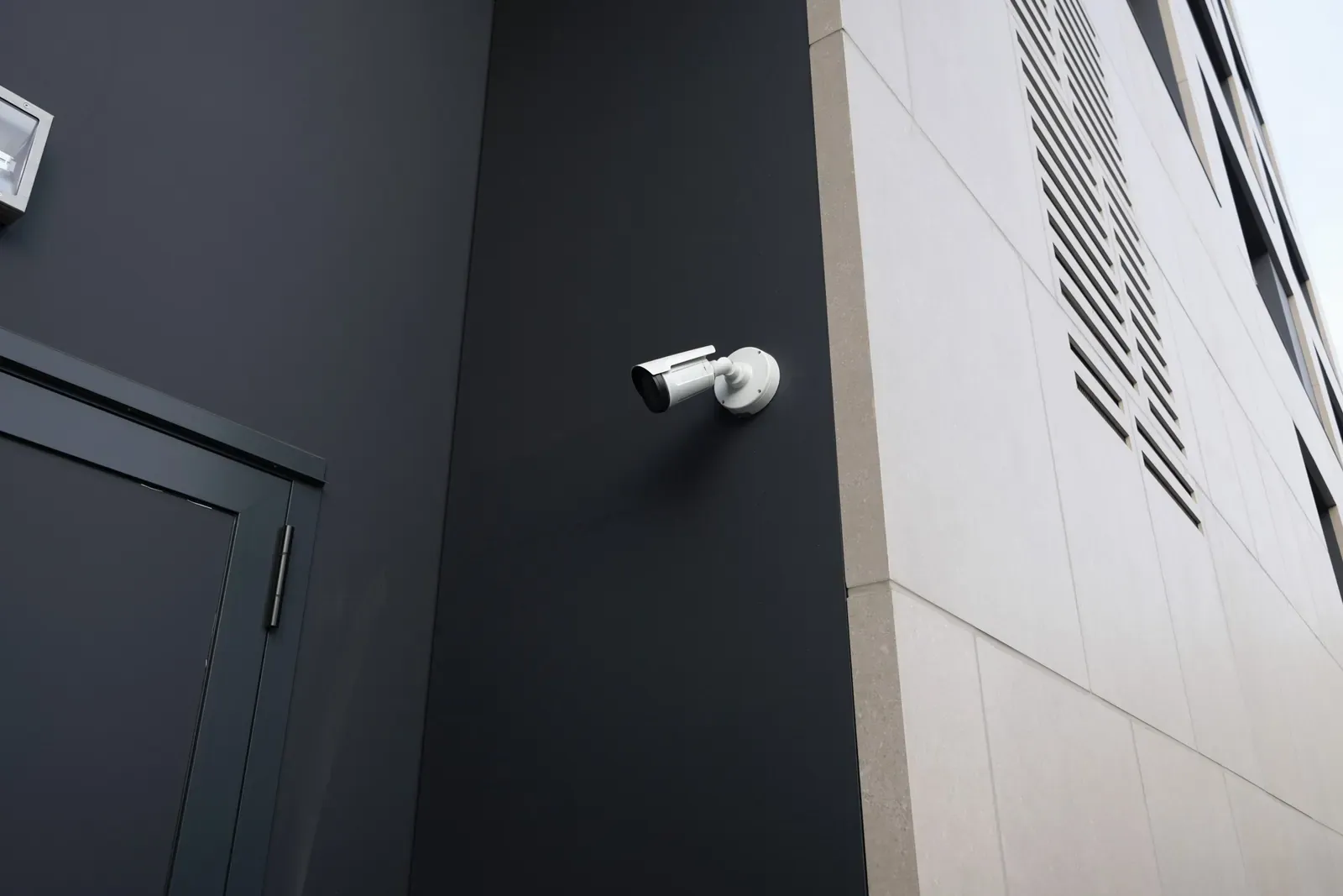 entrance of night club or discotheque with security camera