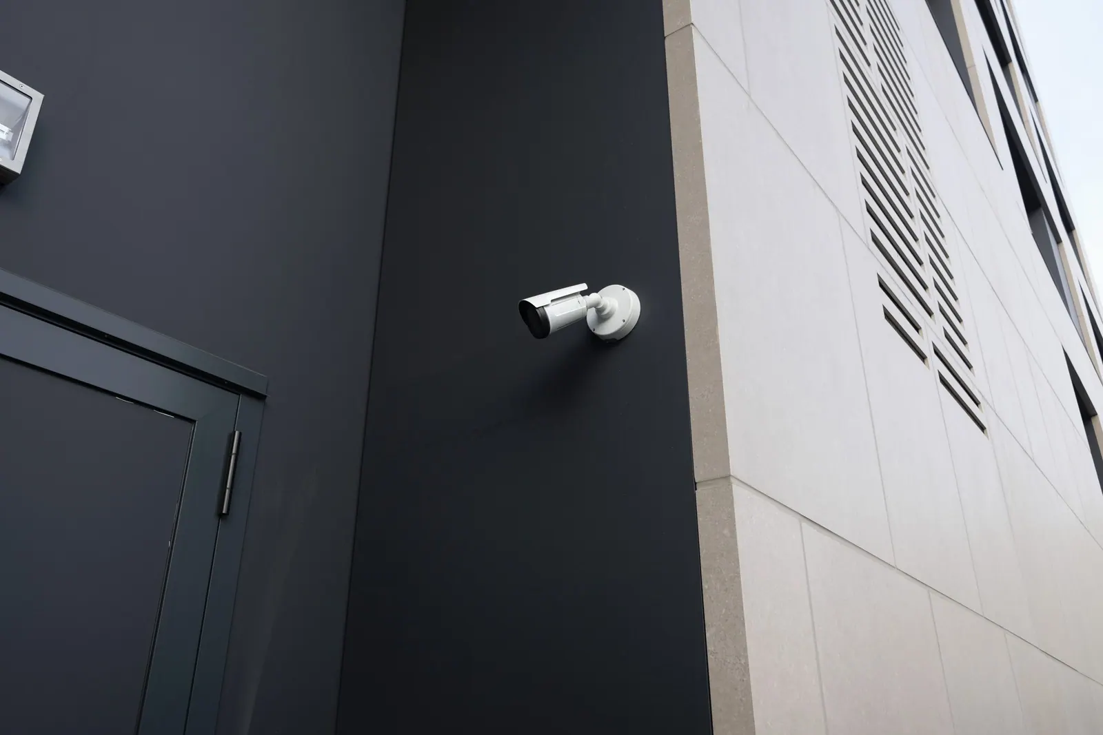 entrance of night club or discotheque with security camera